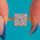 Art Deco Diamond square cluster ring, front view of the scalloped halo